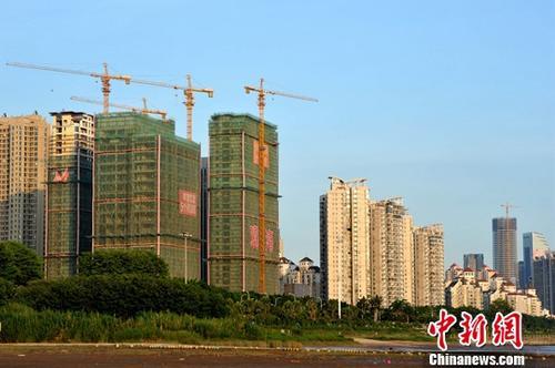 资料图：正在建设中的房地产楼盘。a target='_blank' href='http://www.chinanews.com/'中新社/a记者 张斌 摄